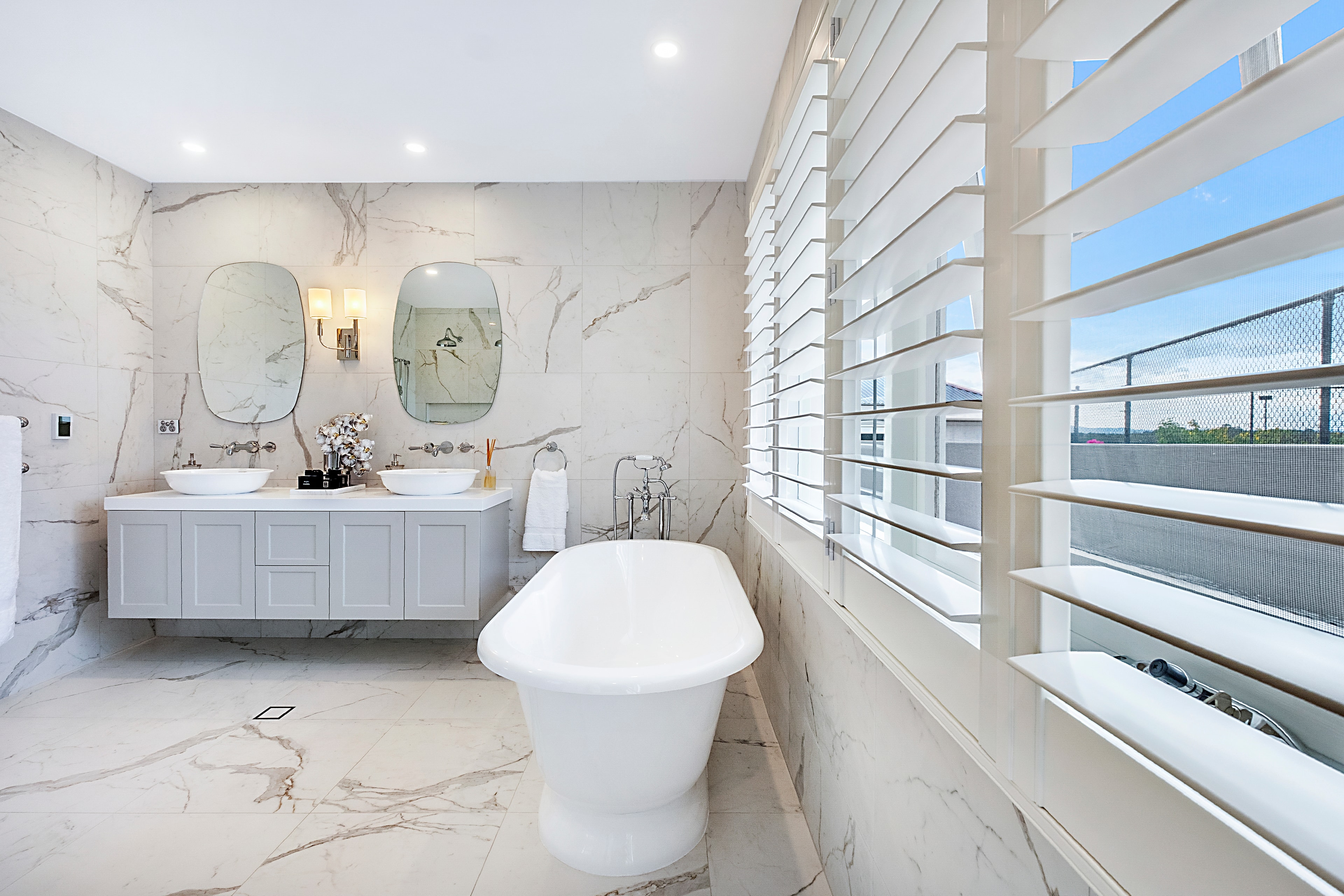 Kenthurst ensuite — dual vanity with vessel sinks, freestanding bath and plantation shutters