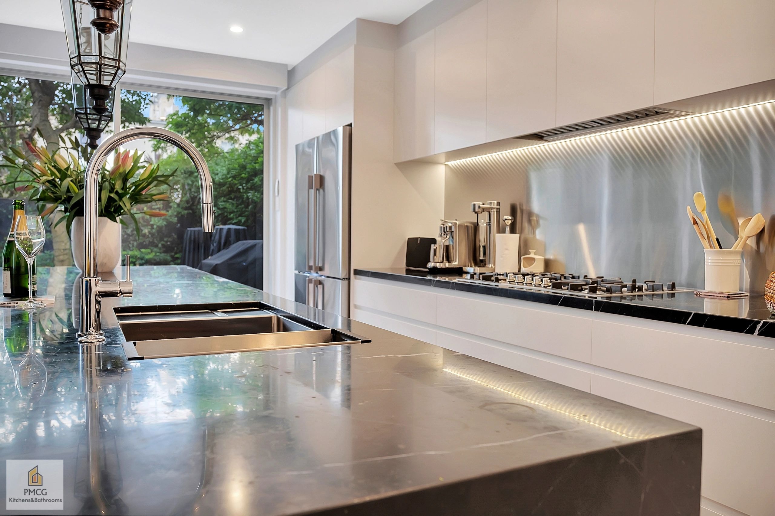 Luxury kitchen renovation with island sink and pendant lighting — Annandale